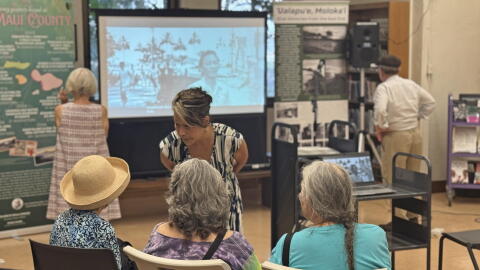 Kunmi Yu Danico, the director of the UH Center for Oral History, talks with Maui women during the Oral Histories of Maui event in Wailuku on July 20, 2026.