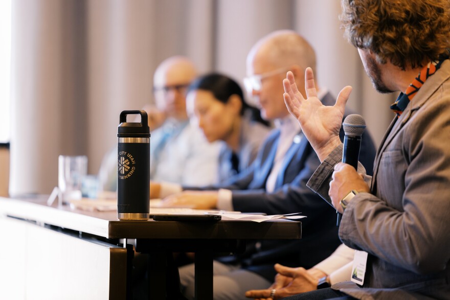 Scott House, Senior Director of Partner Services at the Park City Chamber of Commerce and Visitors Bureau, moderates a panel about the future of snow-reliant tourism in Utah May 10, 2026, at the Zions Bank Wasatch Back Economic Summit.