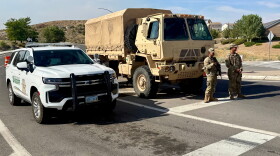 The Nevada Army National Guard blocks roads to prevent the public from re-entering evacuation zones, Sunday, Aug. 23, 2026.