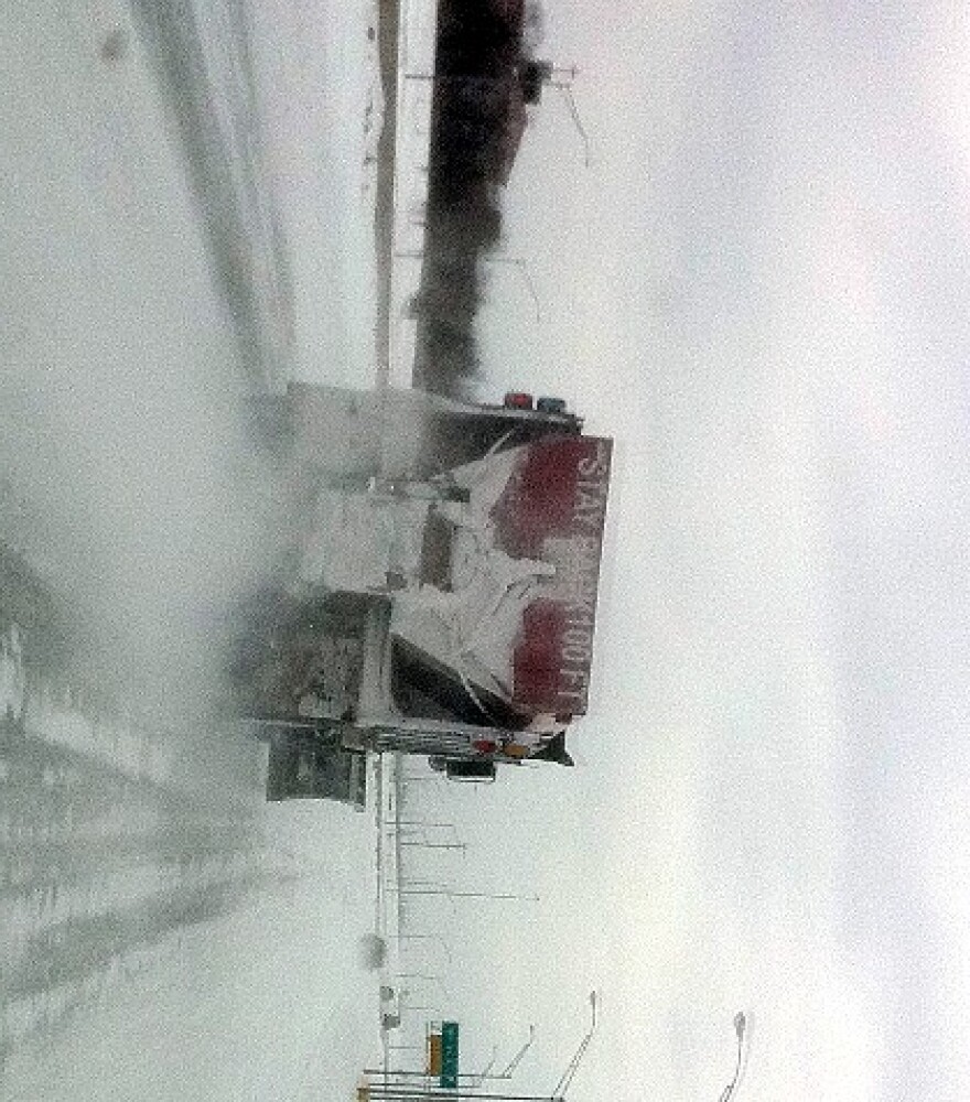 Snow plow works Highway 169 near 91st Street.