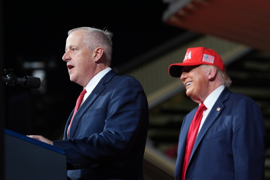President Donald Trump listens as North Carolina Republican U.S. Senate candidate Michael Whatley speaks during a rally at Gastonia Municipal Airport, Wednesday, Sept. 16, 2026, in Gastonia, N.C.
