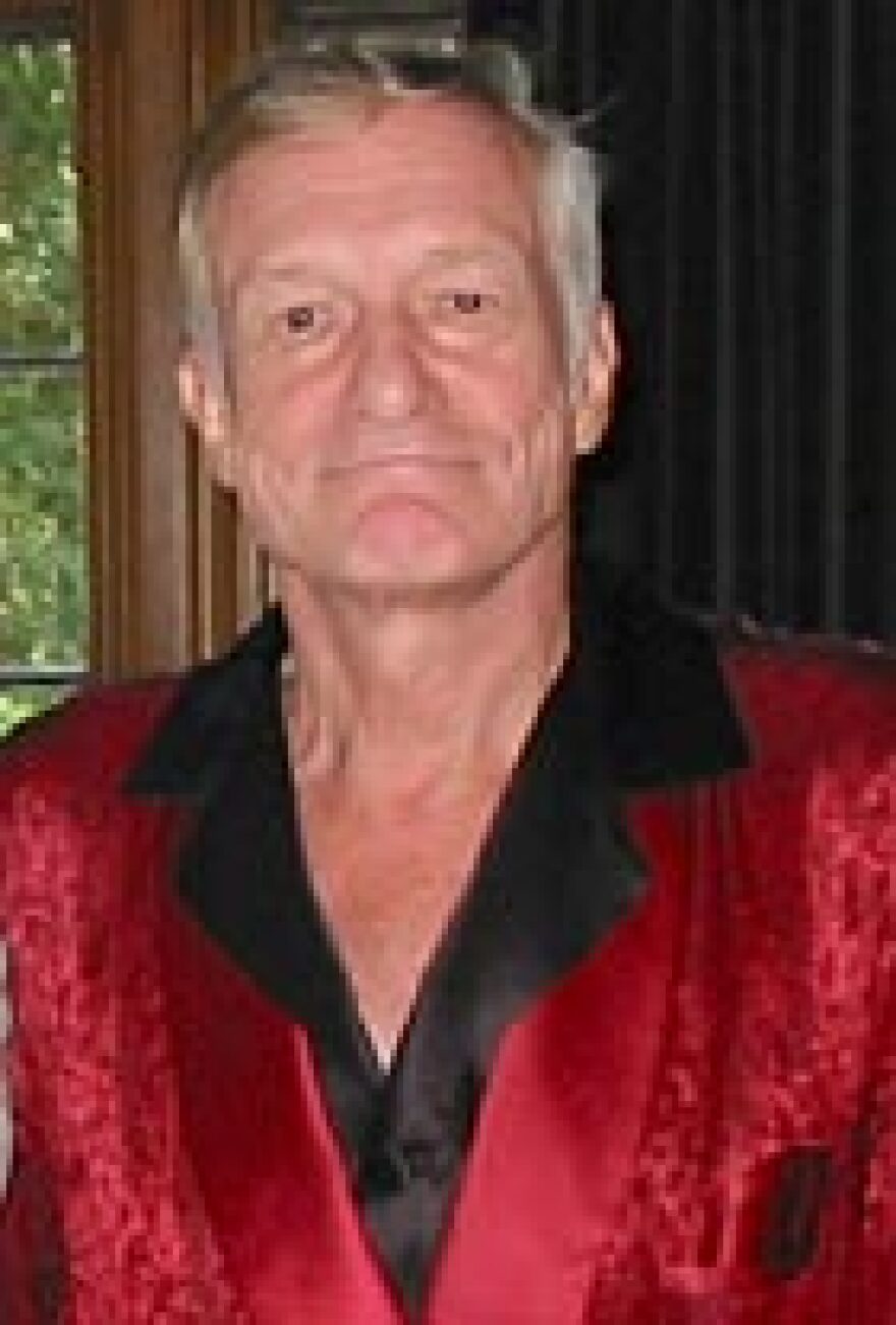 Hugh Hefner in his Playboy Mansion library.