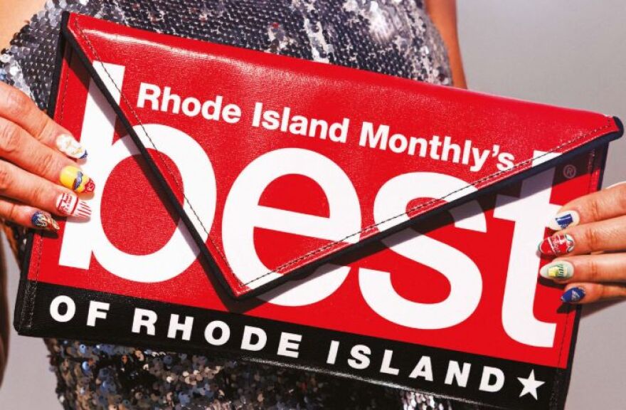 The cover of the August, 2026 issue of Rhode Island Monthly features local handbag designer Kent Stetson as well as nail art with a Rhode Island theme