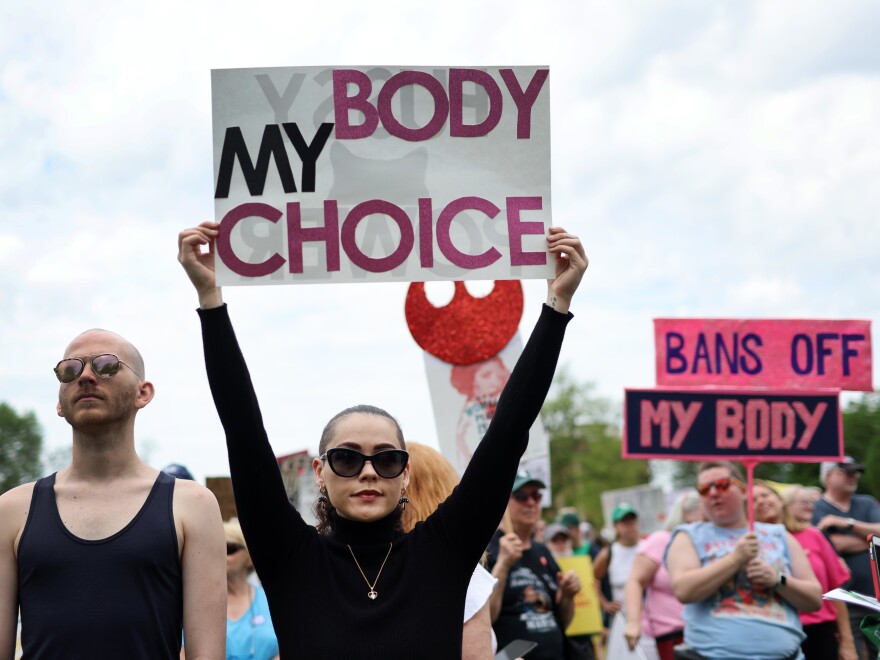 Abortion rights demonstrators rally in Union Park before marching into downtown Chicago on Saturday. The march was one of many taking place nationwide as concerns grow over a leaked draft opinion from the Supreme Court that would end federal protections for women choosing to have an abortion.