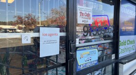 A Latino store in Durham on November 19, 2025 displays a sign meant to keep immigrant enforcement agents away.