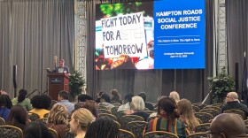 CNU professor Johnny Finn welcomes those attending the 2026 Hampton Roads Social Justice Conference at Christopher Newport University on April 14.