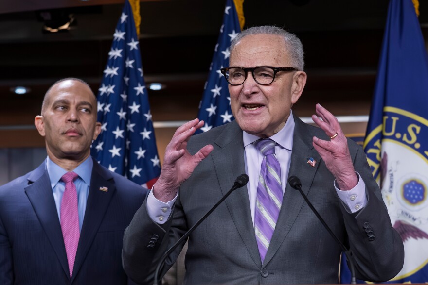 Senate Minority Leader Chuck Schumer, D-N.Y., center, speaks during a news conference as House Minority Leader Hakeem Jeffries, D-N.Y. listens, at the Capitol in Washington, Wednesday, Feb. 4, 2026.
