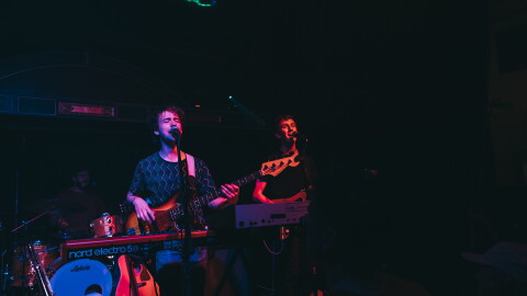 Two men performing on stage