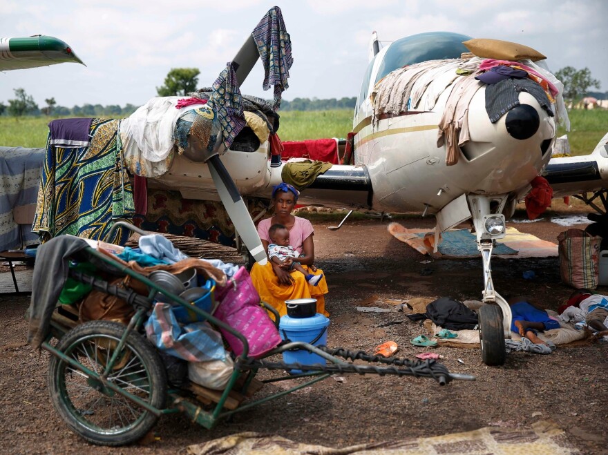 Christians gather in a makeshift camp for internally displaced people at the airport in Bangui on Dec. 13. More than 30,000 people have gathered there.