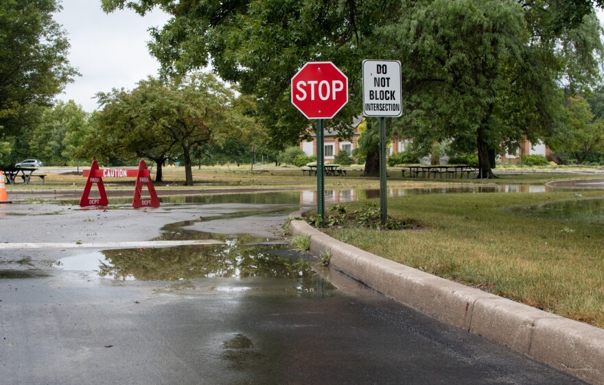 Water is receding from the entrance at the Fort Wayne's Children Zoo after intense rains flooded parts of the park on Tuesday.
