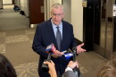 Greg Ballard, an independent candidate for secretary of state, speaks to reporters after delivering a notification of his new lawsuit to the Indiana Election Commission on Thursday, Oct. 15, 2026.