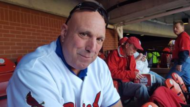 Bob Grana poses for photo at a St. Louis Cardinals game