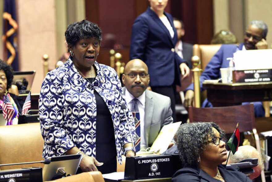 Assembly Majority Leader Crystal D. Peoples-Stokes, D- Buffalo, speaks while debating bills in the Assembly Chamber at the state Capitol, Sunday, March, 31, 2019, in Albany, N.Y. (AP Photo/Hans Pennink)