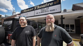Jay Morang, left, and Brad Ritter stand outside Charlotte's Manor Theatre. The small art house theater announced its permenant closure in late May amid the coronavirus pandemic.