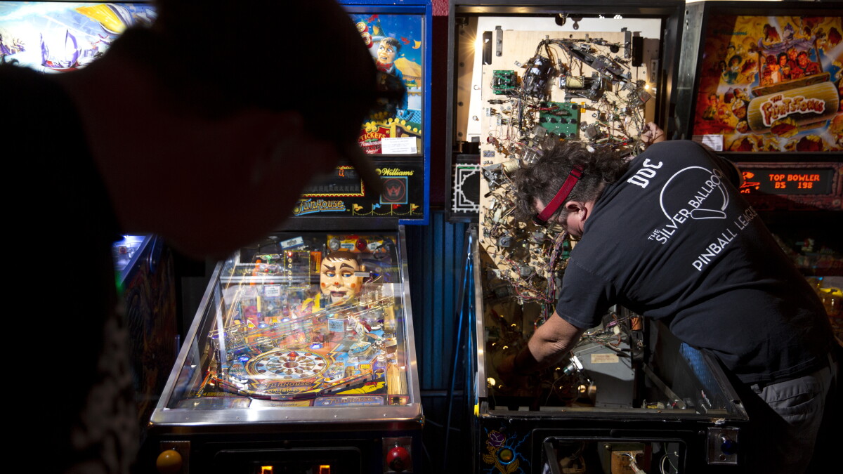 St. Louis pinball repair techs fix 'worlds under glass' with specialized skills - Vimarsana News