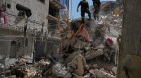 Lebanese civil defense workers inspect the rubble at the site of a building destroyed in an Israeli airstrike a day earlier in Beirut, Lebanon, Thursday, April 9, 2026. (Hussein Malla/AP)