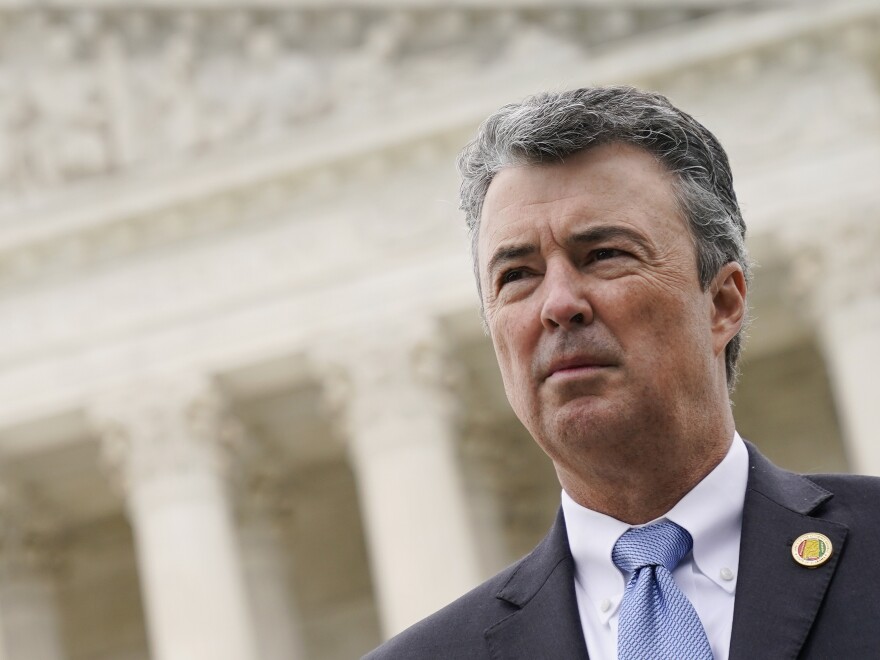 Alabama Attorney General Steve Marshall listens to a reporter's question following oral arguments in an Alabama redistricting case, outside the Supreme Court on Capitol Hill in Washington on Oct. 4, 2022.