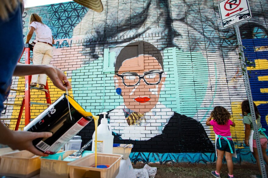 Artist Soledad Fernandez-Whitechurch organizes a mural depicting the late Supreme Court Justice Ruth Bader Ginsburg at Agave Print in East Austin on Oct. 11.