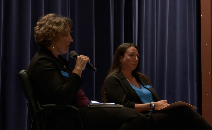 Bloomington Mayor Kerry Thomson and HAND director Anna Killion-Hanson discuss housing issues during a town hall at Jackson Creek Middle School.