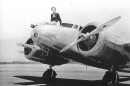 Amelia Earhart sits on her Lockheed Model 10-E Electra in March 1937.