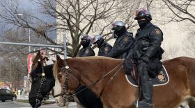 Pennsylvania State Police Troopers monitor an area near the Pa. state Capitol Jan. 6, 2020. Brett Sholtis / WITF