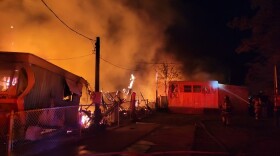 Yuma firefighters respond to a fire at the Desert Palm Mobile Home Park in Yuma on Tuesday, April 19, 2022.