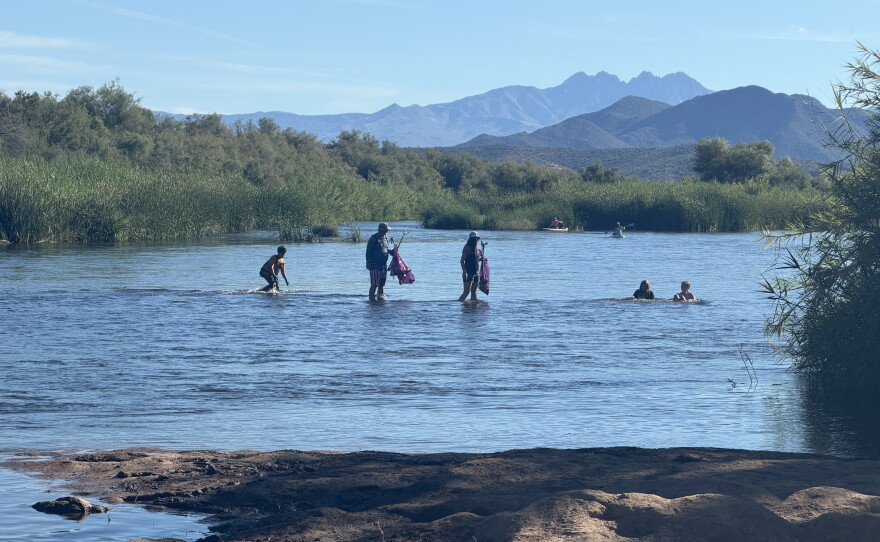 Volunteers remove trash from the Salt River on National Public Lands Day