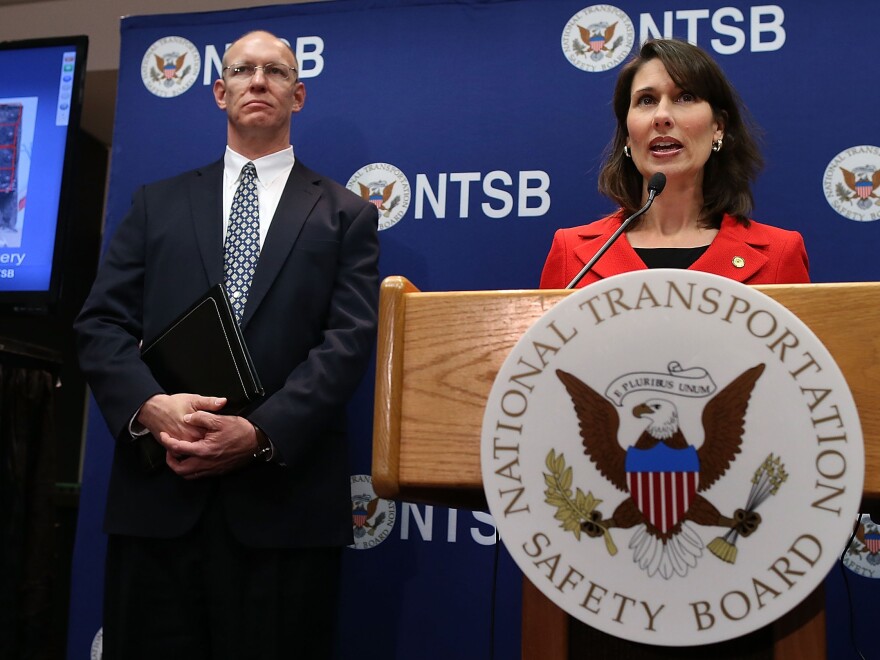 National Transportation Safety Board Chairman Deborah Hersman speaks as NTSB Aviation Safety Director John DeLisi looks on during a news briefing on the Boeing 787 investigation Thursday.