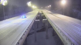 Heavy snowfall is visible on the Eagle River bridge at about 6:10 a.m. Tuesday, Dec. 7, 2022. (From 511.alaska.gov)