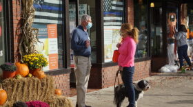 Bob Hebert, a Republican legislative candidate in Ridgefield, talks to a voter outside the GOP headquarters on Main Street in Ridgefield.