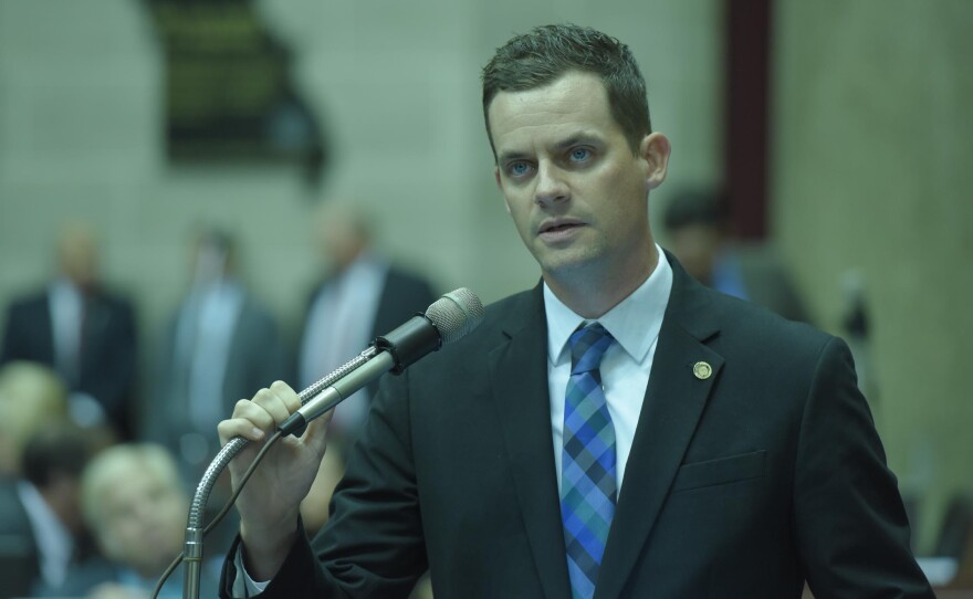 State Rep. Justin Alferman speaks at the microphone during Wednesday's veto session. Lawmakers overrode Gov. Jay Nixon's veto of Alferman's photo idenitifcation bill.