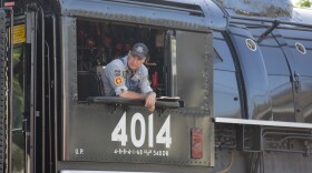 Ed Dickens, senior manager of heritage operations for Union Pacific, waits for departure in Sayre on Friday morning.