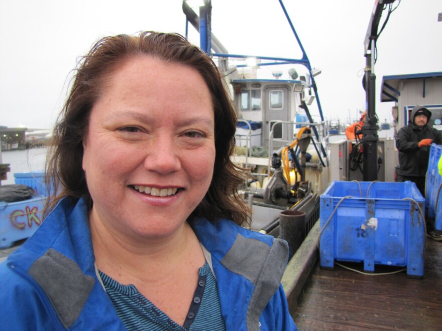 Fawn Sharp, president of the Quinault Indian Nation, stands on the docks as tribal crabbers unload their catch. The tribe has vowed to fight the oil train-to-ship terminals  proposed for Grays Harbor.