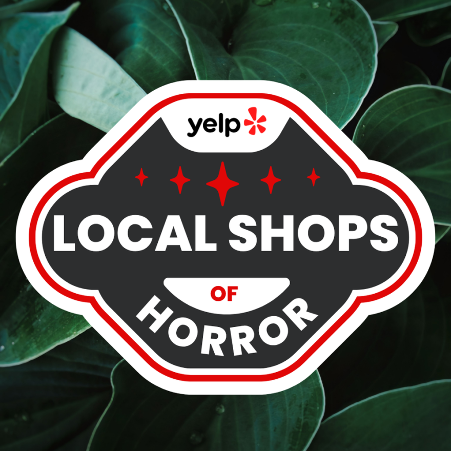 A logo for Yelp's Local Shops of Horror event on a green leafy background