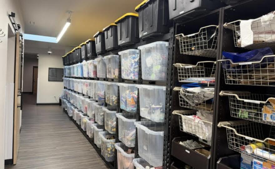 These bins hold hygiene items and other supplies that are free to take at the drop-in, Jan. 26, 2026. 