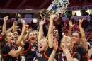 Girls high school basketball players inside an arena