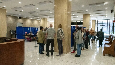 Early voting lines snaked around the lobby at the Rousseau Center on October 21, 2026.