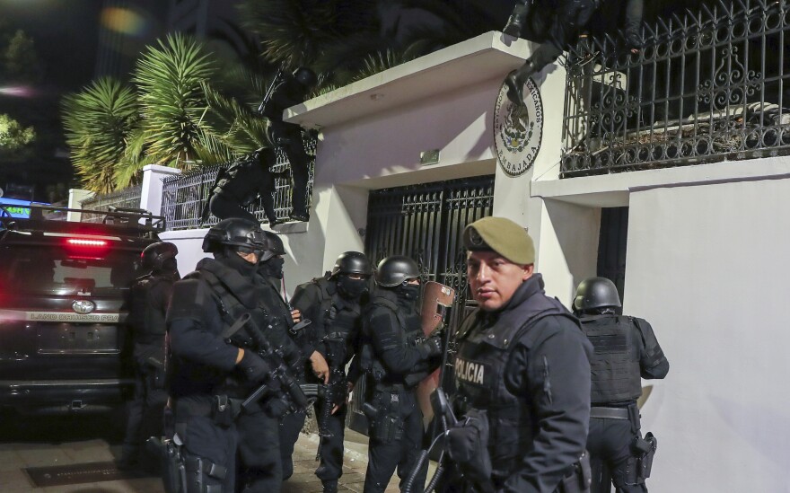 Police break into the Mexican embassy in Quito, Ecuador, Friday, April 5, 2024.