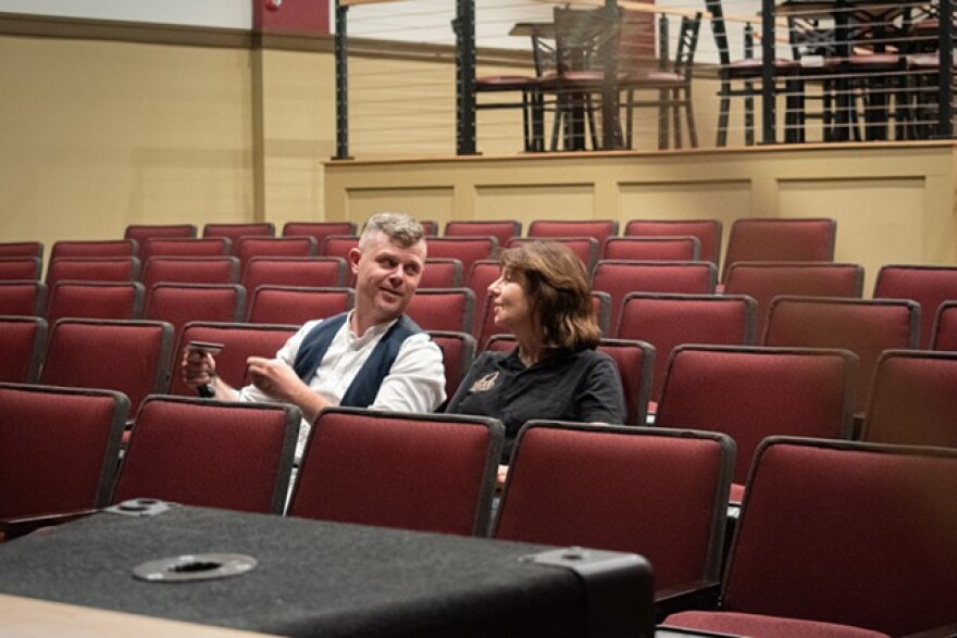 Fletcher and Ann Younger sit in the renovated Avon Park Theater.