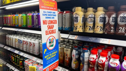 A sign at the H-E-B on University Boulevard in Round Rock warns customers that some items, including candy and sweetened drinks, are no longer eligible for SNAP purchases.