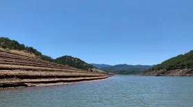 Emigrant Lake outside of Ashland, OR in Jackson County in the summer of 2021. Pictured are the "bathtub rings" showing past water levels in the reservoir.