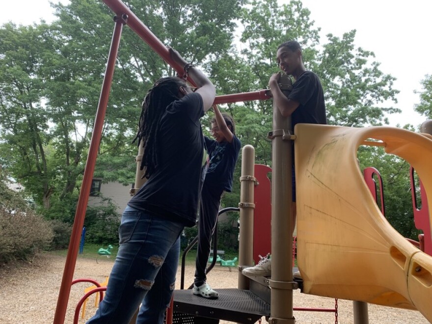 Omega Jade hangs with her daughter Annastasia (middle) and her son, Tyler (right) at Pomeroy Park in Burlington in June, 2023.