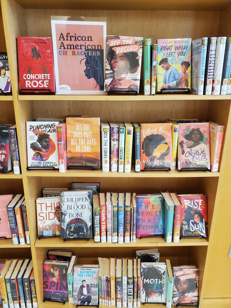 A shelf with "African American Characters" at the Wake County Library Oberlin Road branch.