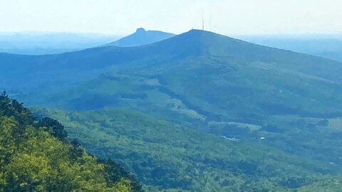 Pilot Mountain and Sauratown mountain peaks as seen from Moore's Knob in Hanging Rock State Park. PAUL GARBER/WFDD