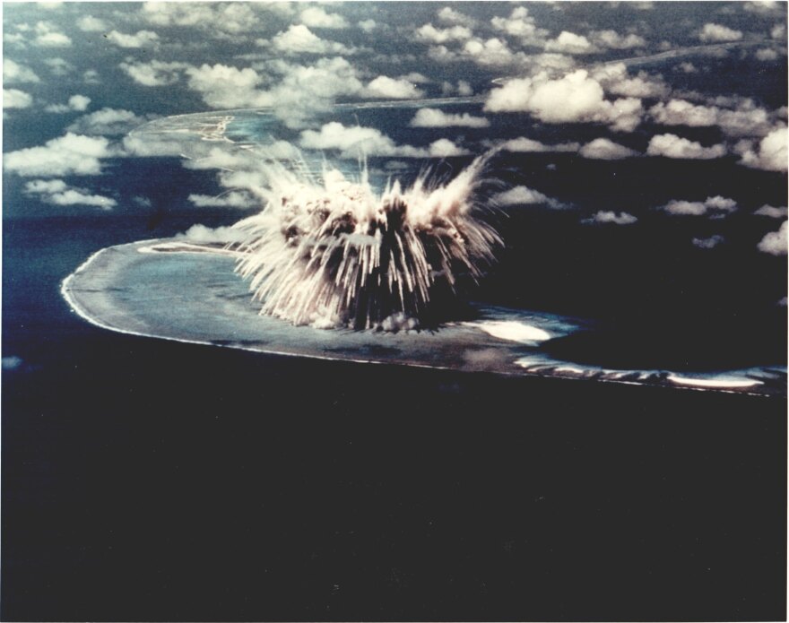 A nuclear bomb explodes on the Enewetok Atoll in the Pacific, where dozens of nuclear tests were conducted in the 1950's and '60's.