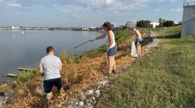 A file photo of volunteers cleaning up the Evansville riverfront during the ORSANCO River Sweep