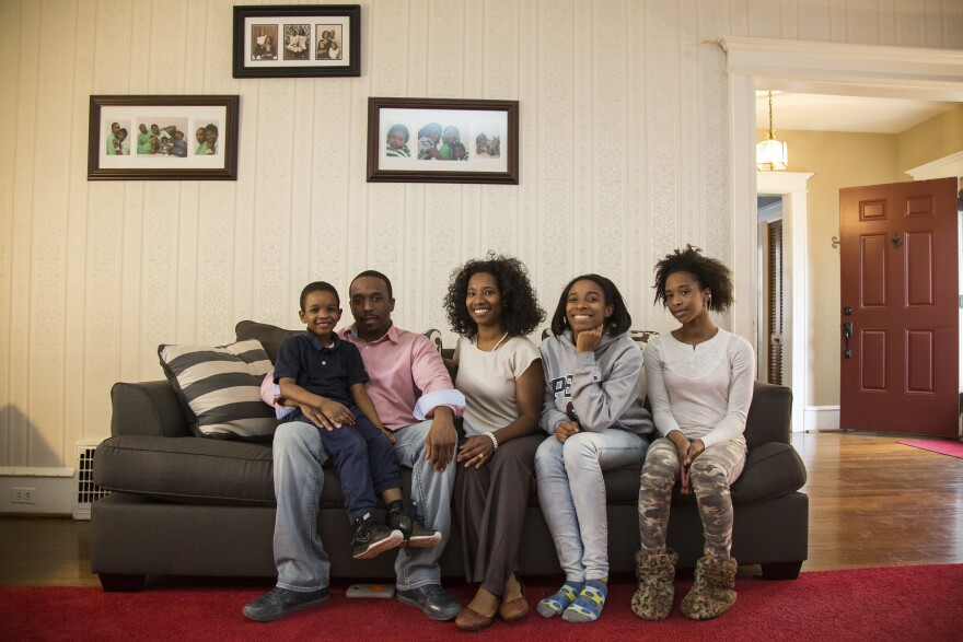 The Miller family sits in the living room of their home in a Philadelphia suburb. They are part of an ongoing lawsuit, arguing Pennsylvania has neglected its constitutional responsibility to provide all children a "thorough and efficient" education.