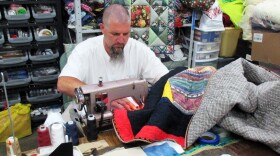 Rod Harney, shown here, has sewn at least two dozen quilts as part of the restorative justice program at South Central Correctional Center in Licking, Missouri. 