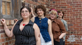 a group of people posing for a photo