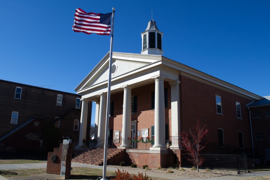 A three-judge panel convened in the Shenandoah County Circuit Courthouse in Woodstock on Monday to hear arguments over whether a school board member-elect with a prior felony conviction is eligible to hold public office.